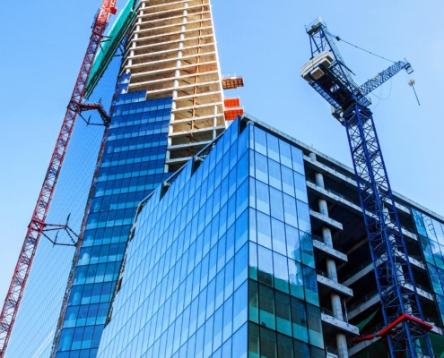 Worm's eye view of high-rise construction